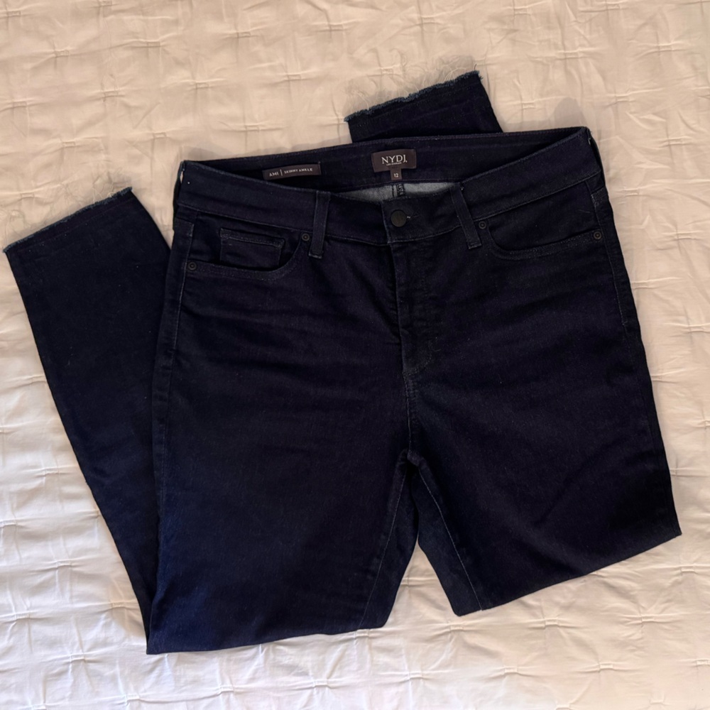 Used, in great condition. NYDJ AMI skinny ankle jeans with frayed hem.